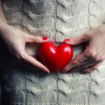 Hand female holding heart