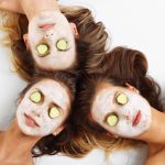 Three friends with facial masks