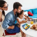 Family breakfast.Young parents with they daughter sitting at the