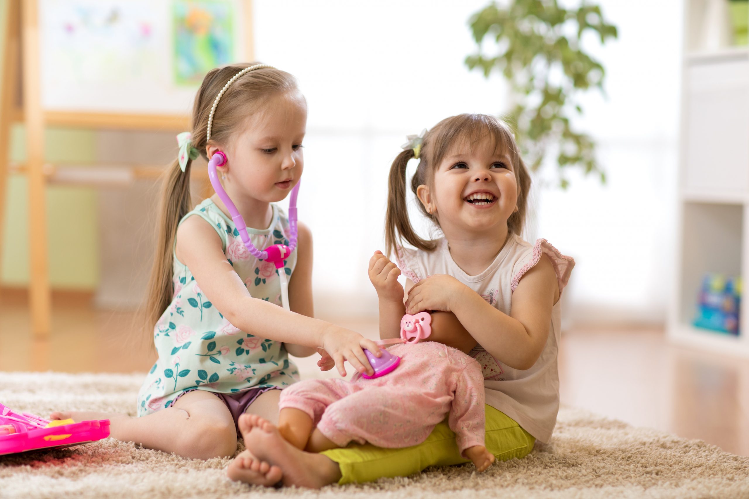 Child playing with pussy